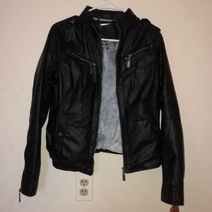 Black leather jacket with fur on the inside